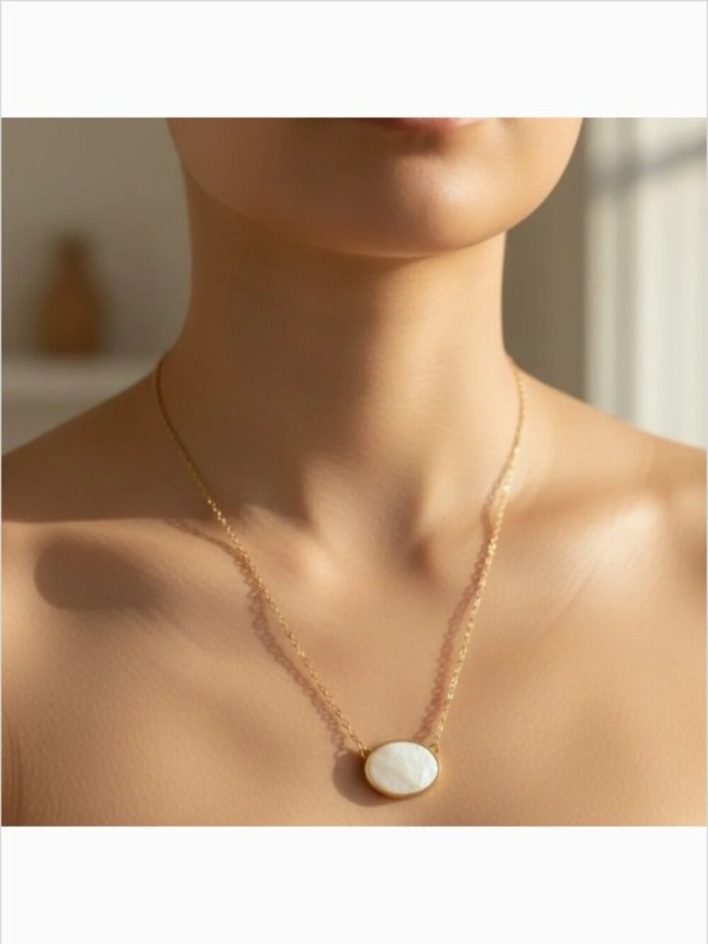 Elegant White Pendant Necklace on a Gold Tone Chain